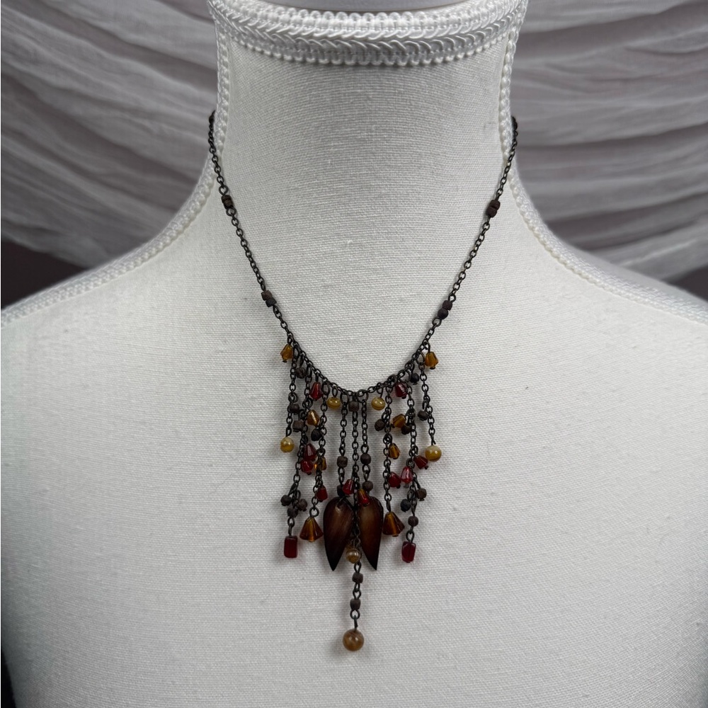 delicate dark chain necklace with cascading beaded fringe